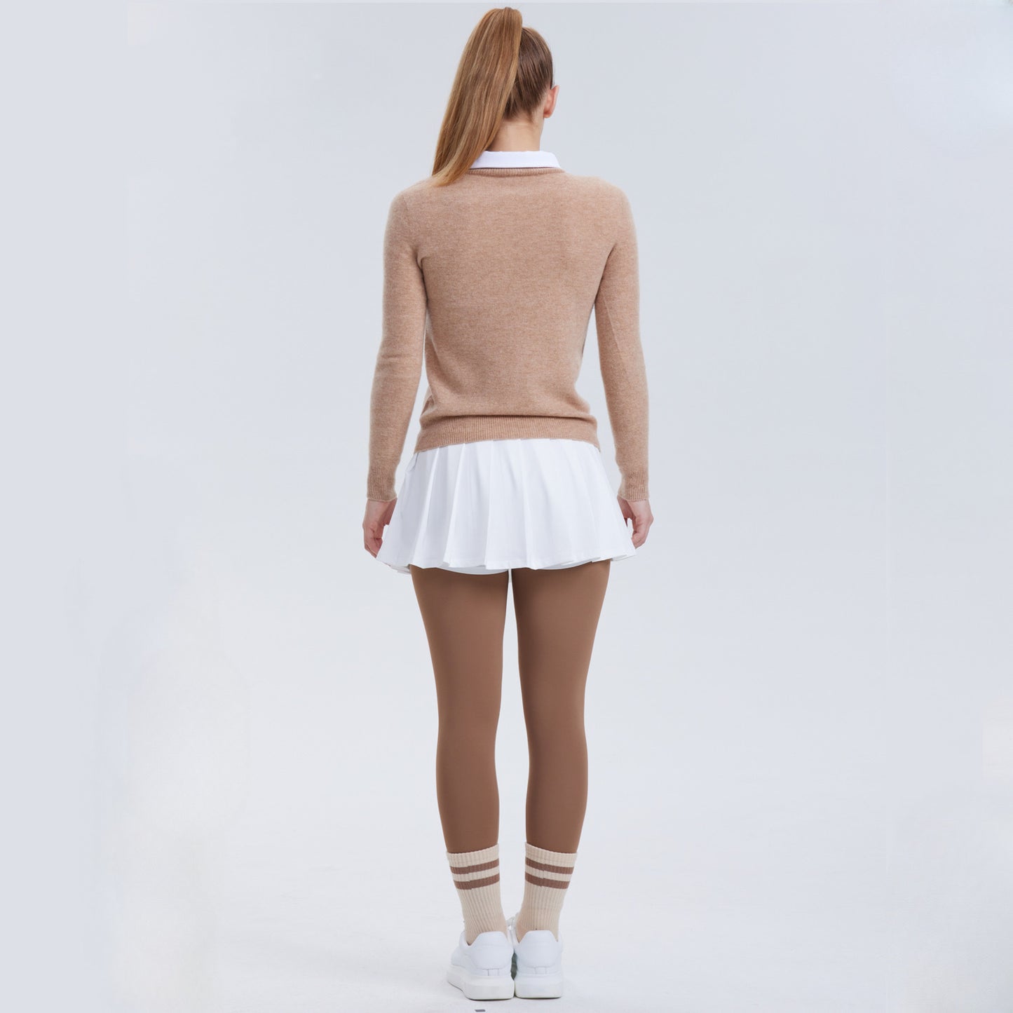Polo vintage-inspired tennis sweater and pleated skirt