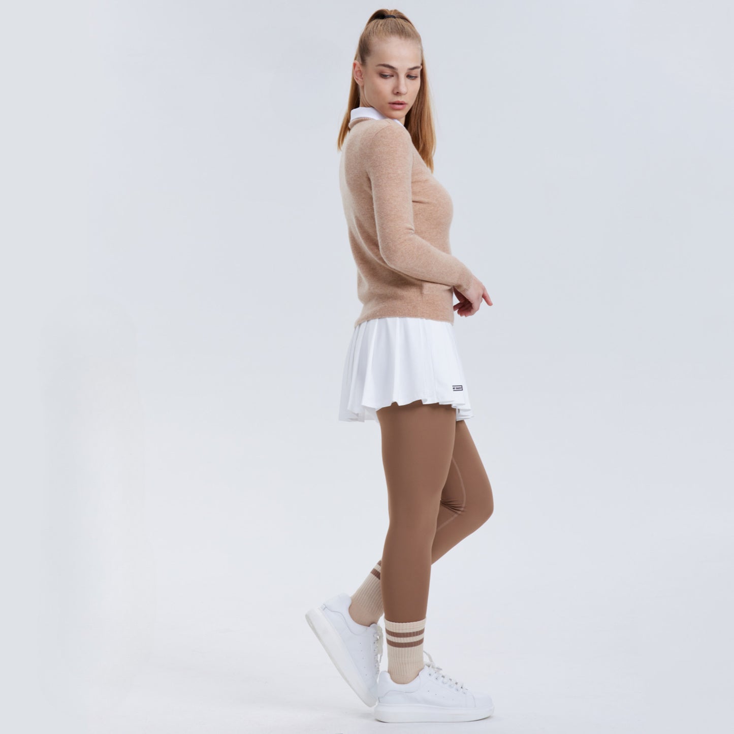 Polo vintage-inspired tennis sweater and pleated skirt