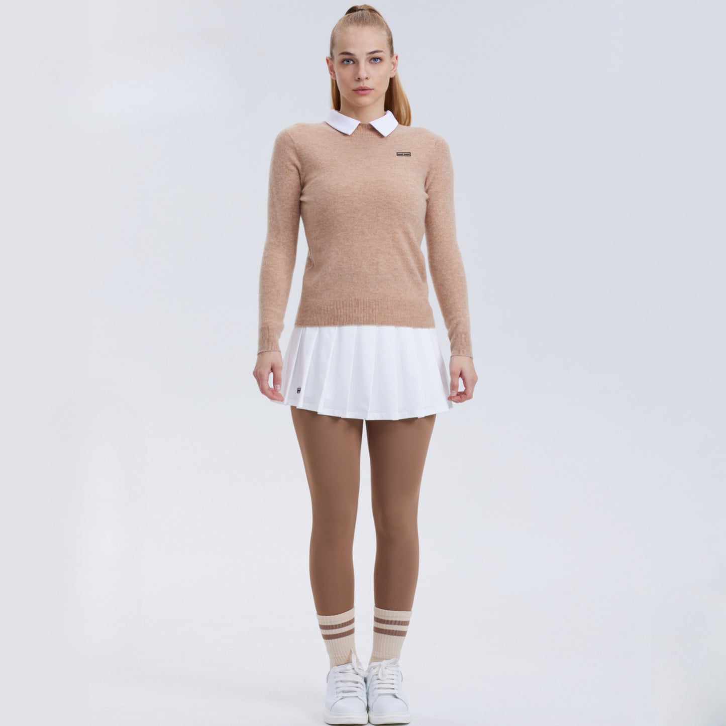 Polo vintage-inspired tennis sweater and pleated skirt