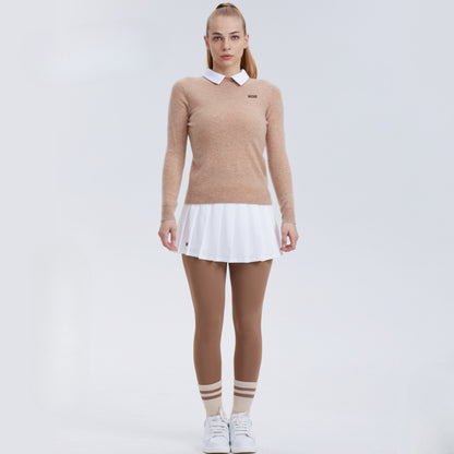Polo vintage-inspired tennis sweater and pleated skirt