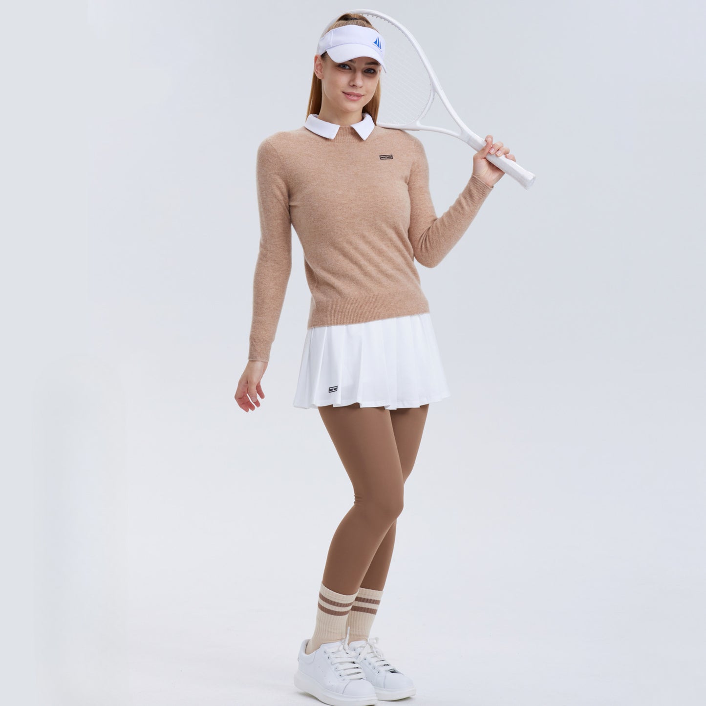 Polo vintage-inspired tennis sweater and pleated skirt