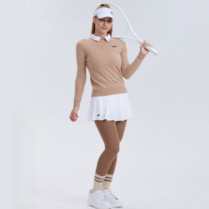 Polo vintage-inspired tennis sweater and pleated skirt